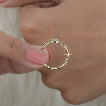 Lab grown diamond engagement ring with pear cut for middle view