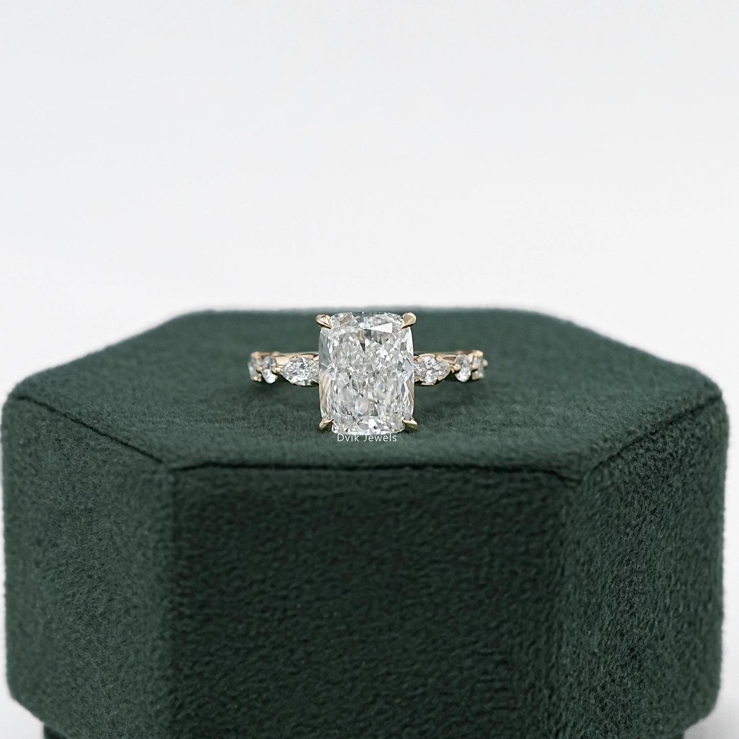 Cushion Cut Diamond Ring with Marquise Side Stones