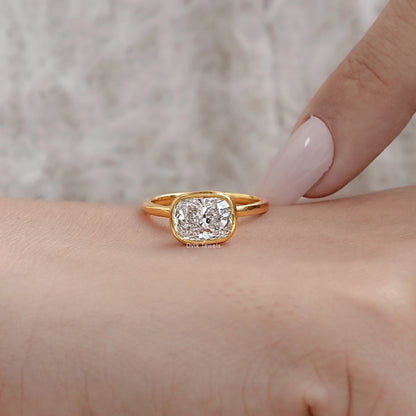 Cushion Cut East-West Bezel Solitaire Engagement Ring