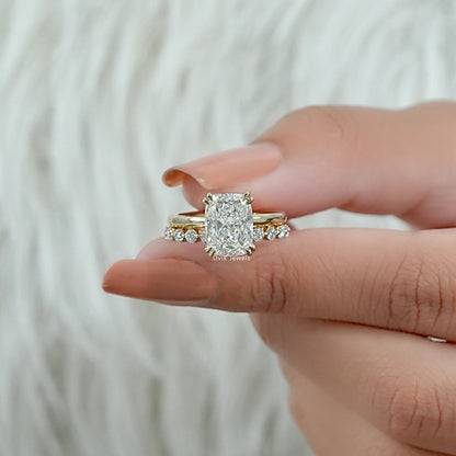 lab grown diamond ring in a classic four-prong setting on a 14k gold band.