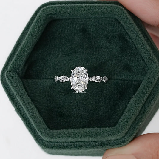 Twist Shank Oval Accent Diamond Ring
