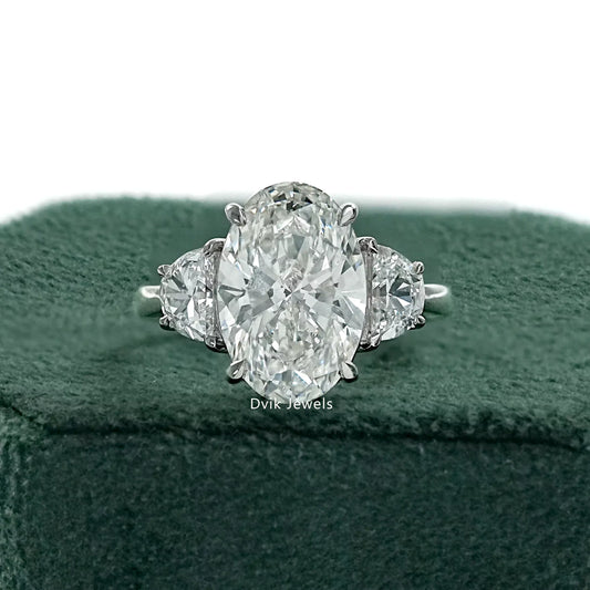 Three Stone Oval And Half Moon Cut Diamond Engagement Ring Ring