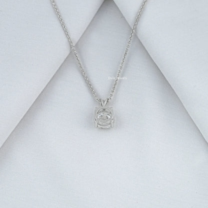 Back view of solitaire necklace with round cut diamond with basket-style setting