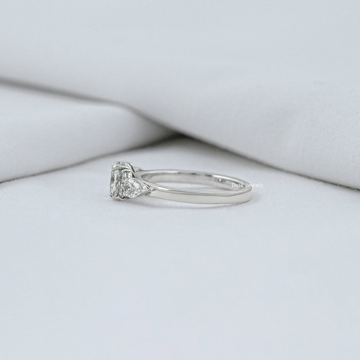 Oval And Pear Diamond Seven Stone Ring