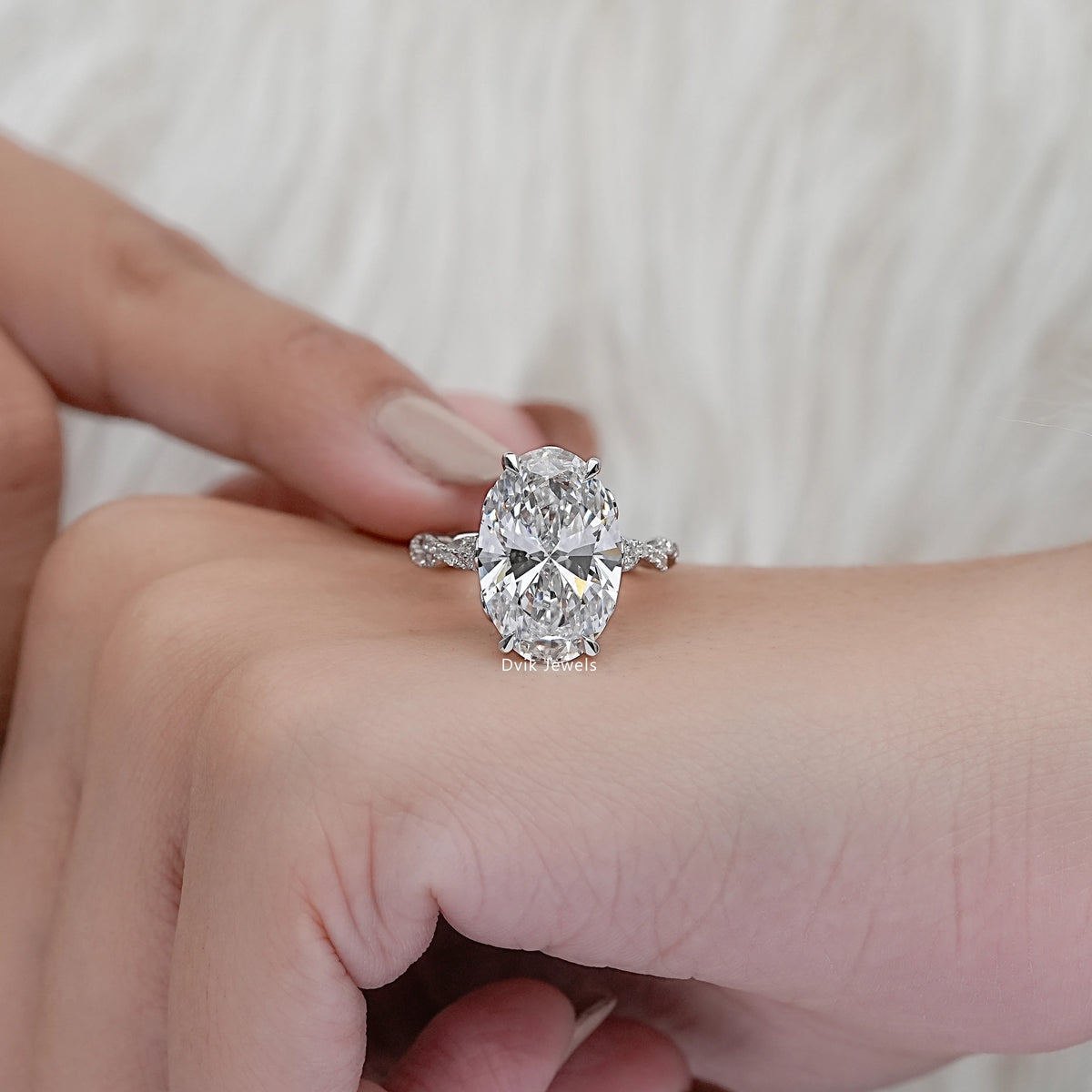 Oval Cut Diamond Twisted Hidden Halo Ring