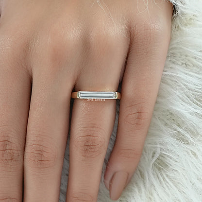 Lab grown baguette diamond engagement ring worn for a bridal style