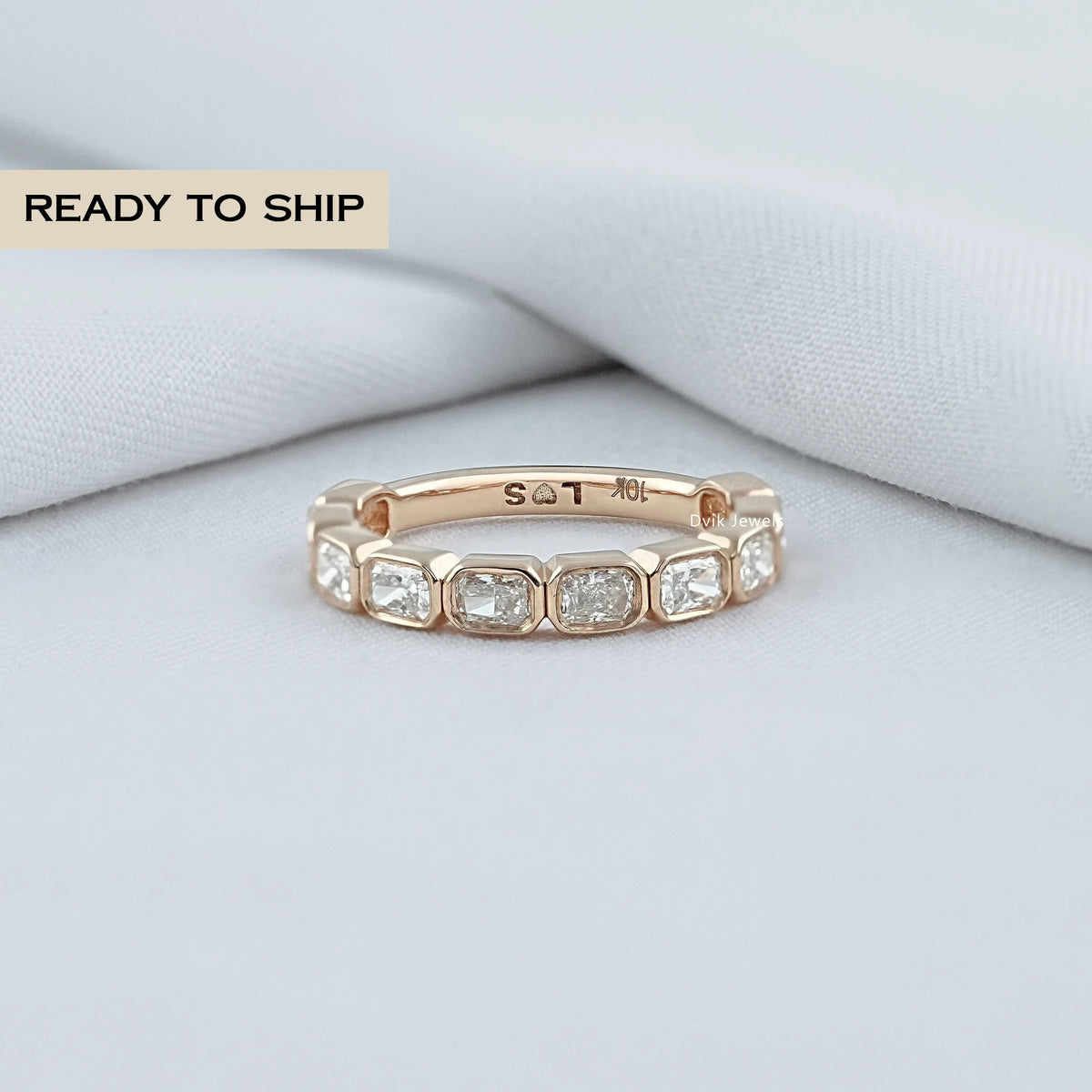 East West Radiant Cut Bezel Wedding Band