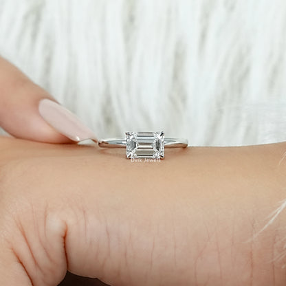 East West Emerald Cut Diamond Solitaire Ring
