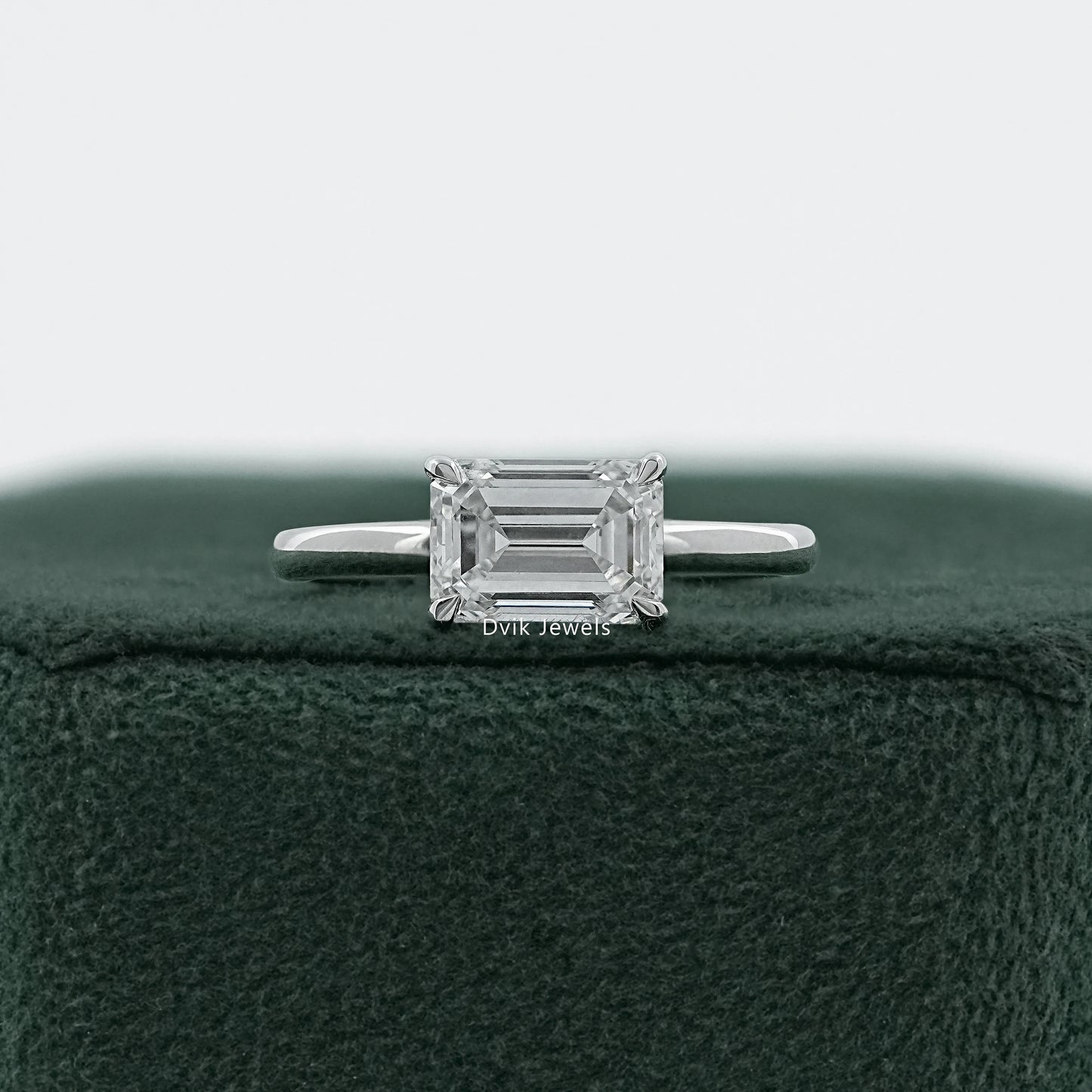 East West Emerald Cut Diamond Solitaire Ring