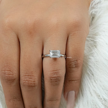 East West Emerald Cut Diamond Solitaire Ring