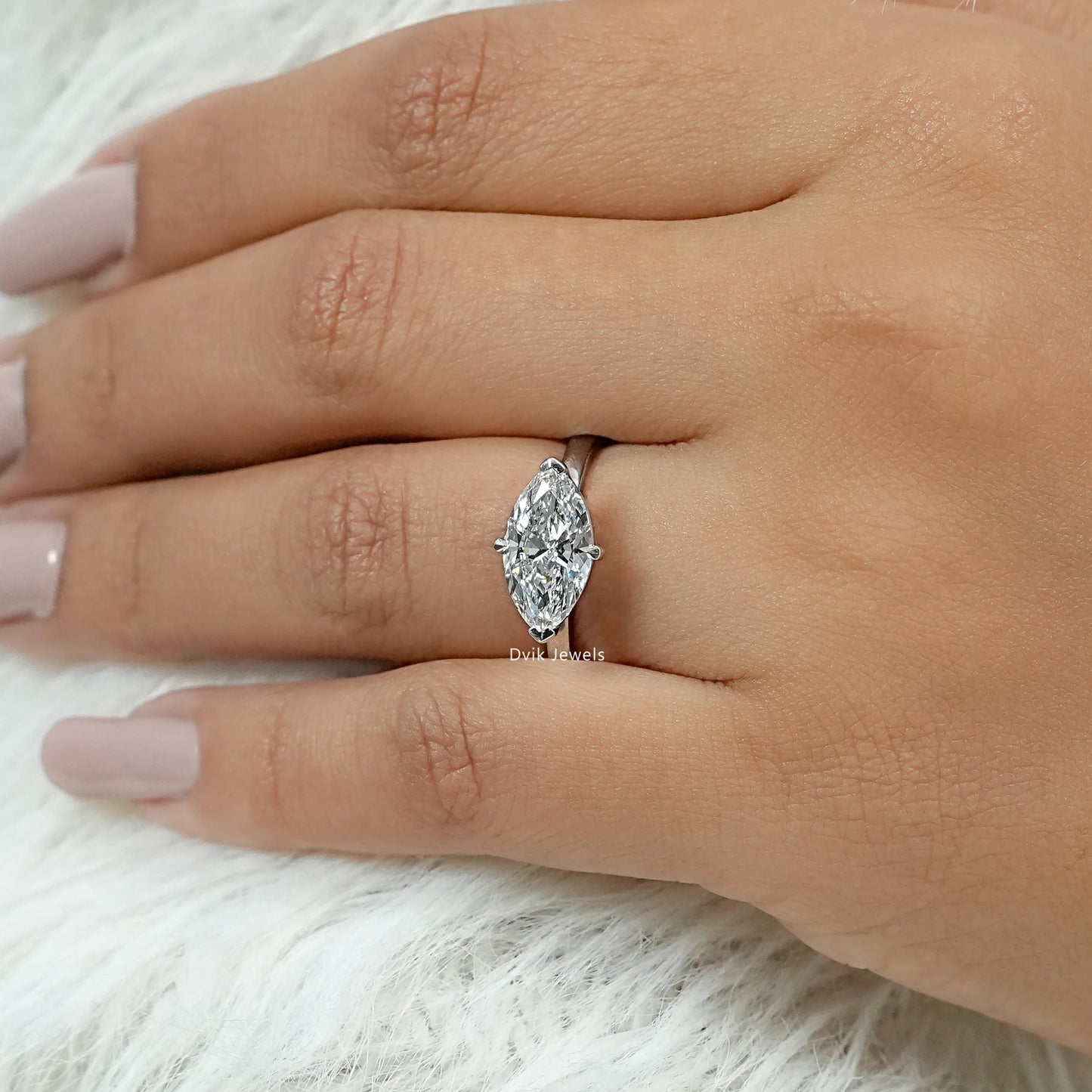 Half Bezel East West Marquise Cut Diamond Ring