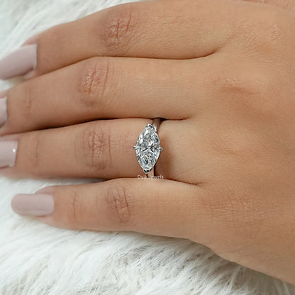 Half Bezel East West Marquise Cut Diamond Ring