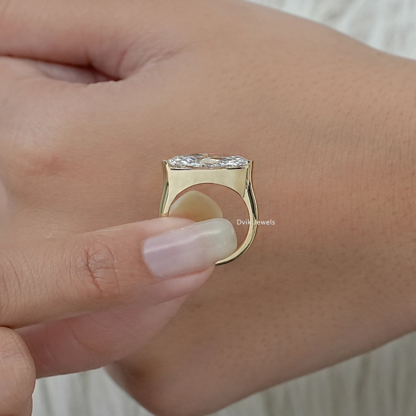 East-West Moval Cut Diamond Solitaire Ring