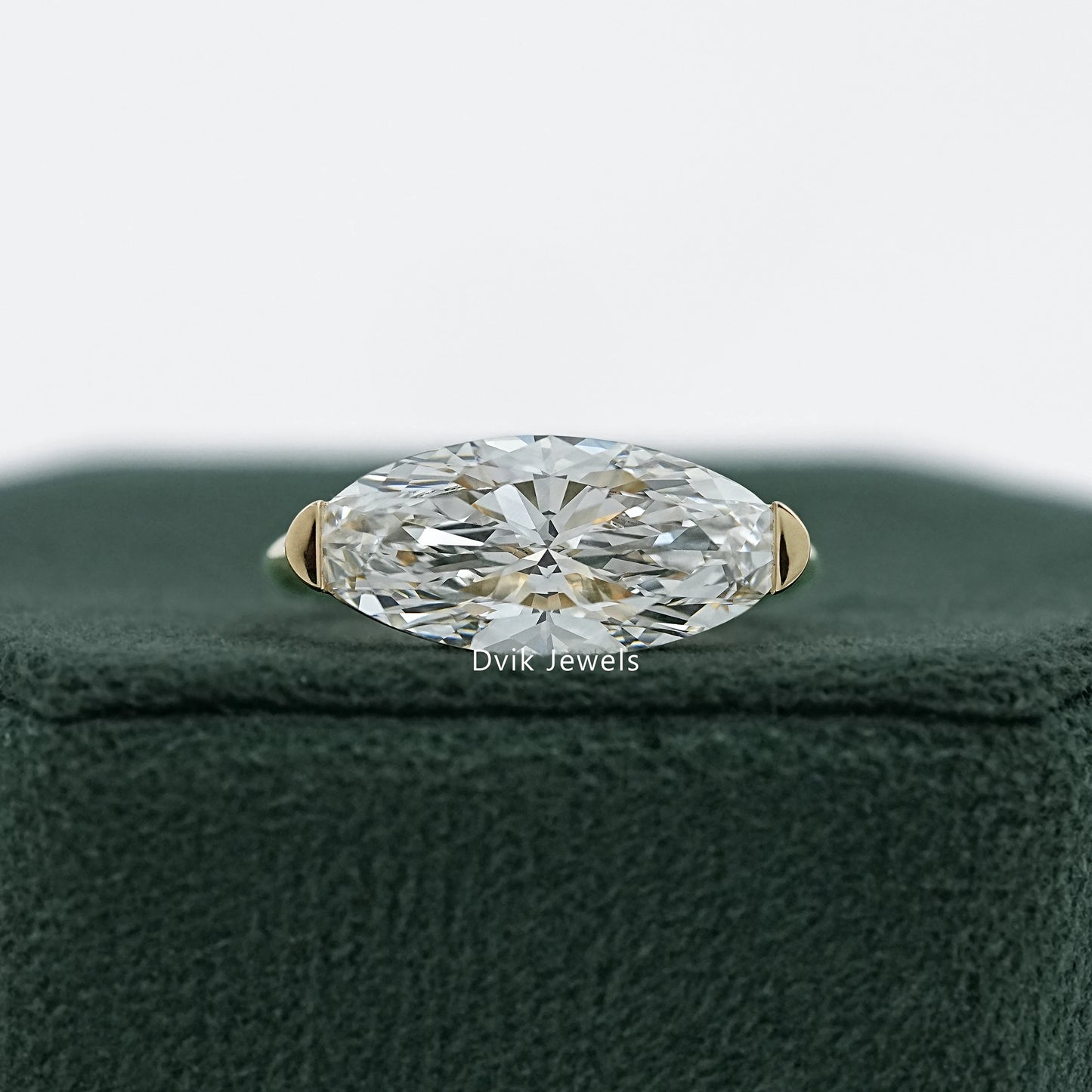 East-West Moval Cut Diamond Solitaire Ring