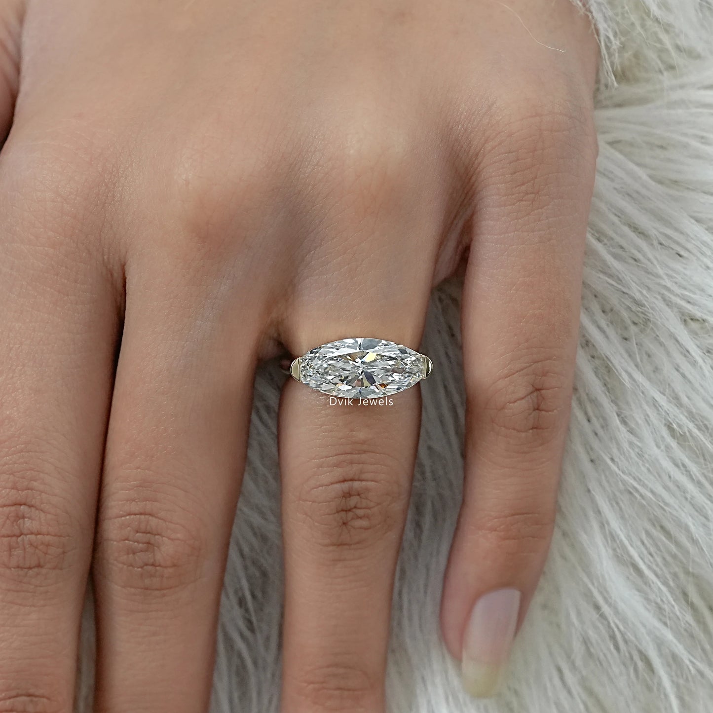 East-West Moval Cut Diamond Solitaire Ring