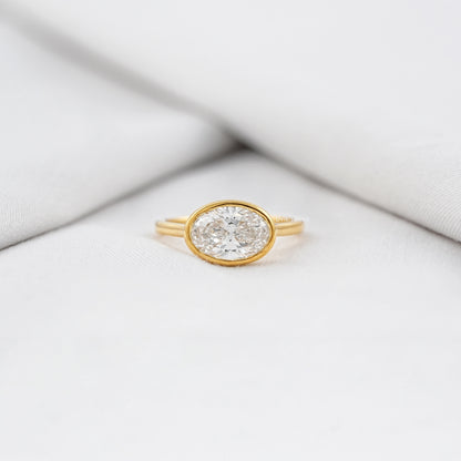 Oval East-West Bezel Engagement Ring