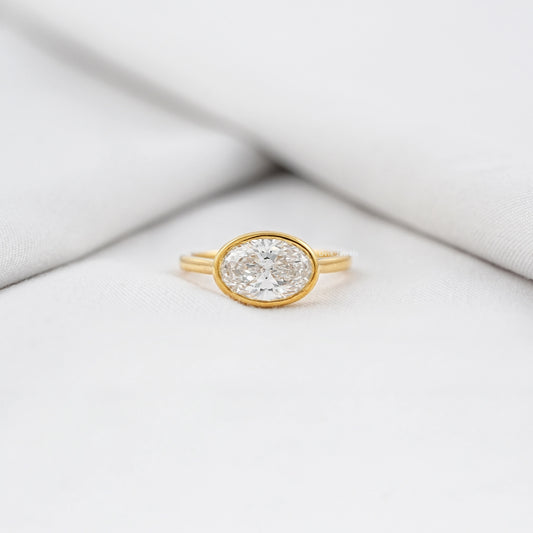 Oval East-West Bezel Engagement Ring