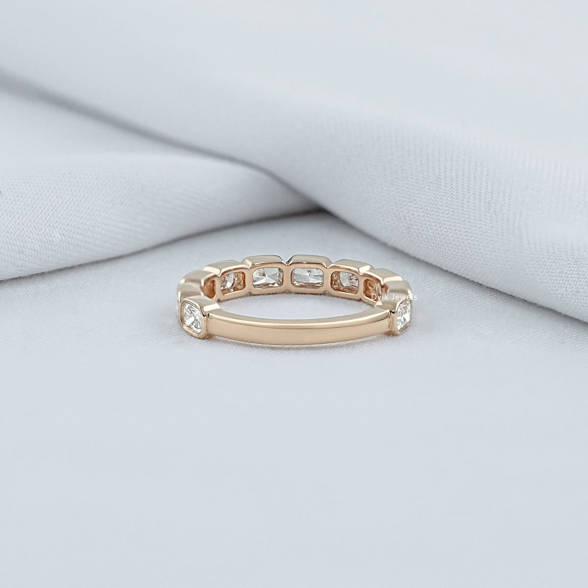 East West Radiant Cut Bezel Wedding Band