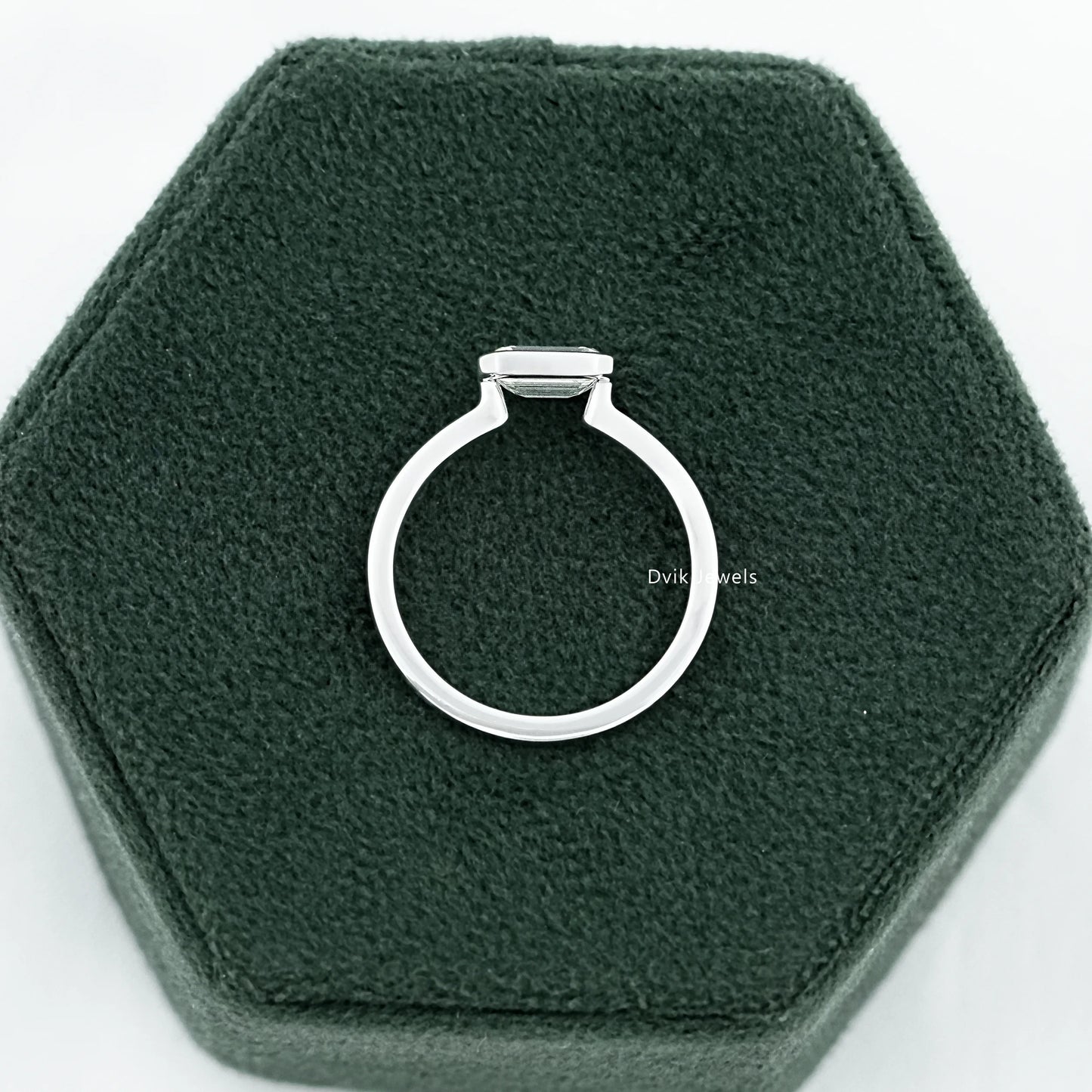 Bezel Set East-West Emerald Cut Engagement Ring
