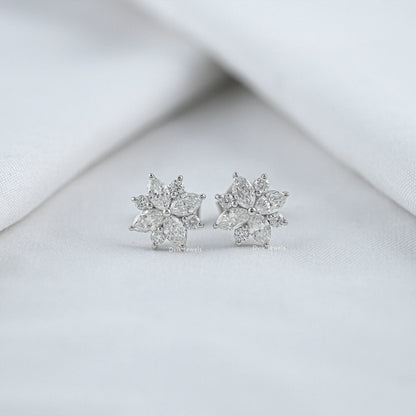 Floral shaped diamond stud earrings with marquise and round cuts