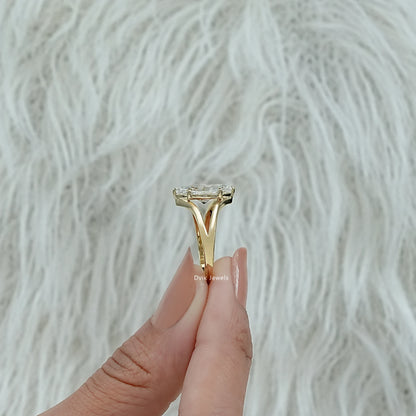 Navette engagement ring laid flat to highlight the detailed prong setting