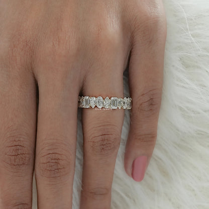 Top view of mixed cut eternity band with prong setting worn on finger