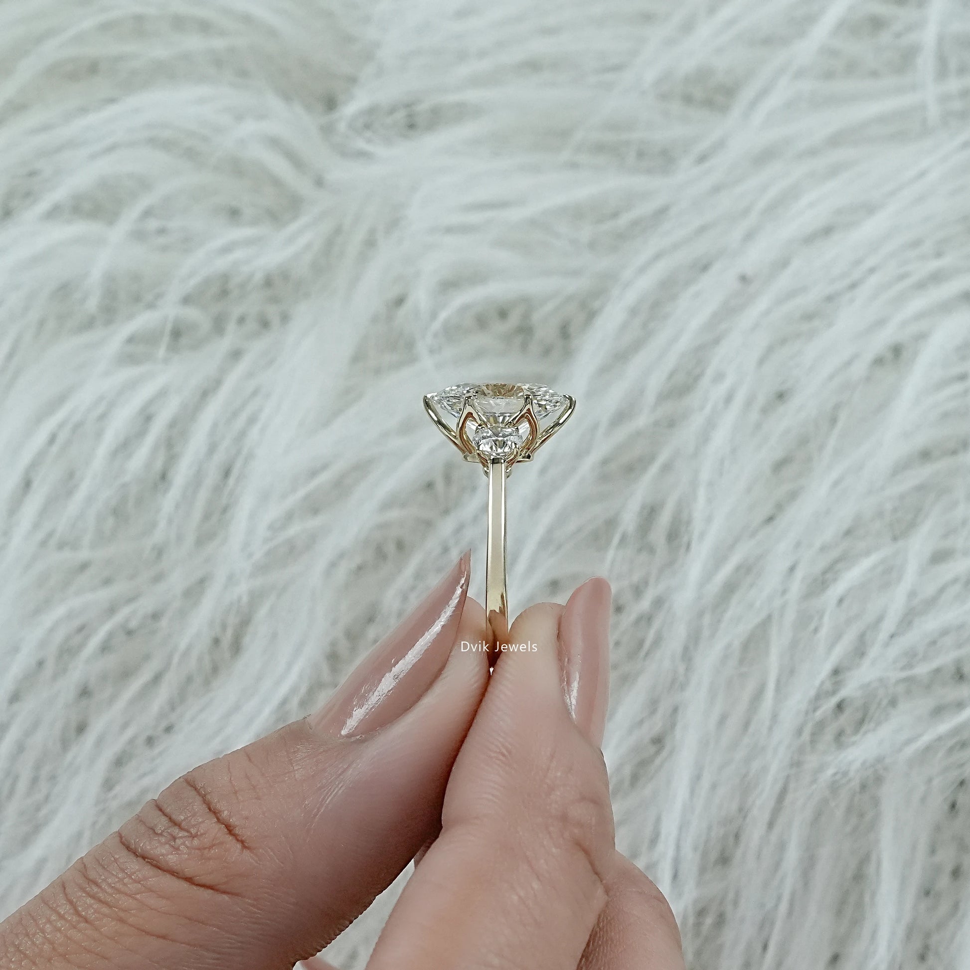 3 carat oval engagement ring worn on a finger for a luxury wedding look