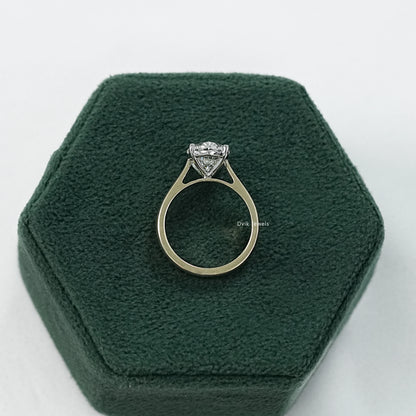 Side angle view of a 1 carat lab grown oval diamond ring displaying the elevated stone height.