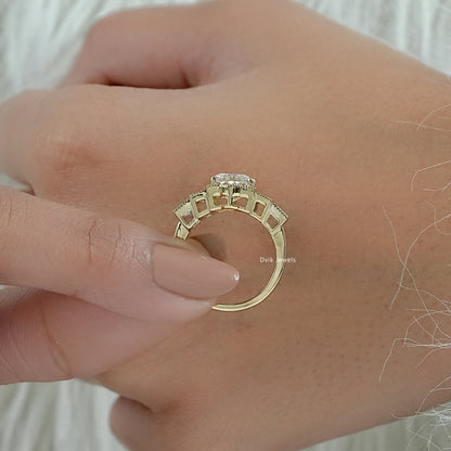 Art deco engagement rings shown in a detailed close-up on white fabric