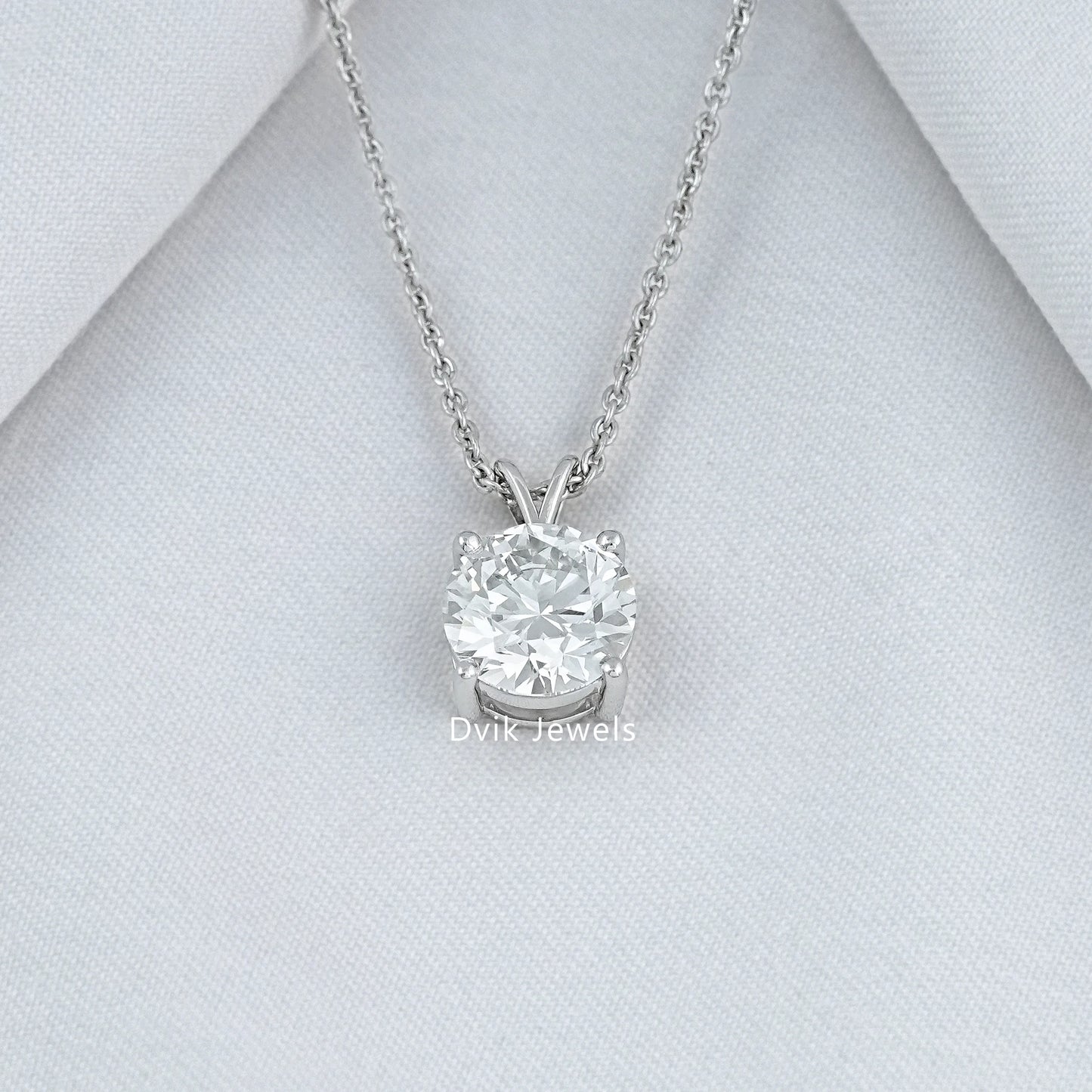 Round lab grown diamond solitaire pendant in white gold by Dvik Jewels