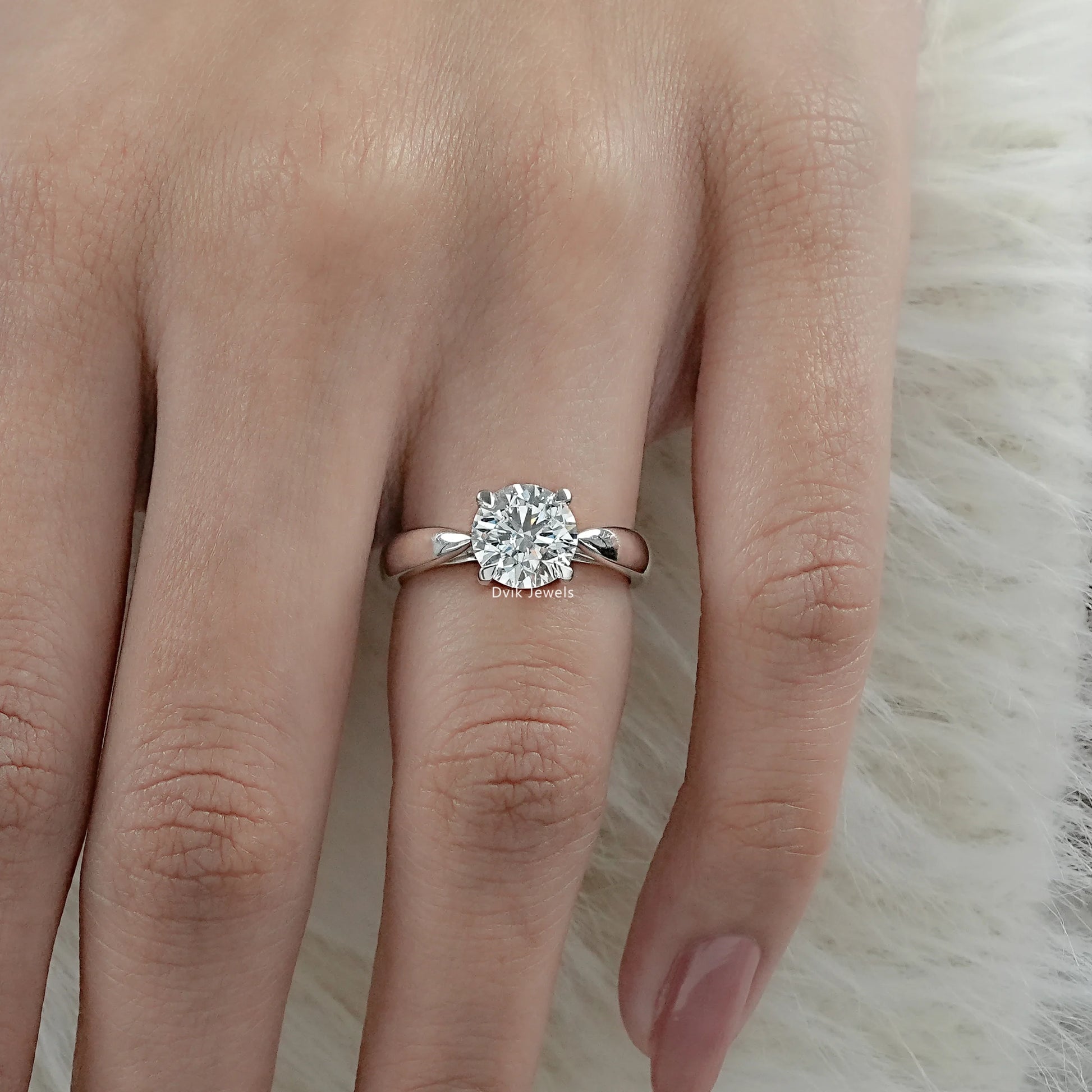 Round Cut Lab Diamond Solitaire Engagement Ring worn on women finger