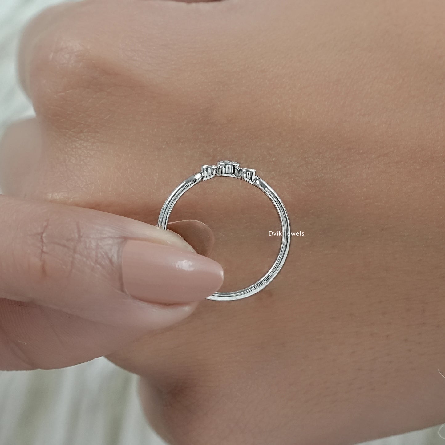 Lab diamond curved wedding band close-up view of the elegant shimmer.