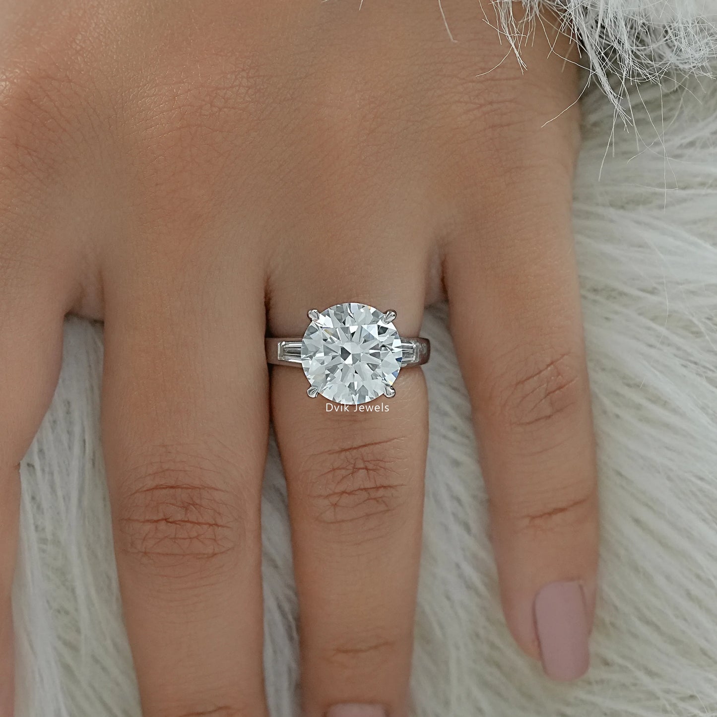 Baguette side stone engagement ring round lab diamond engagement ring top view