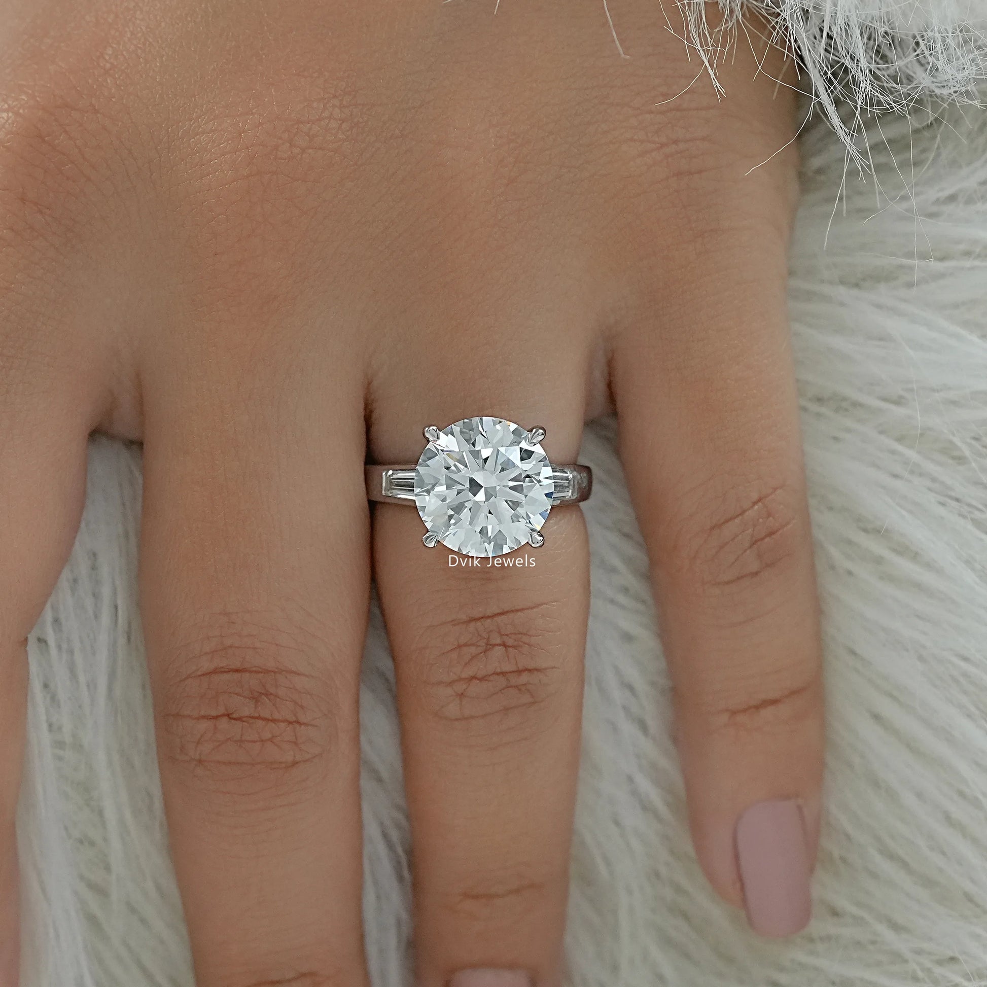 Baguette side stone engagement ring round lab diamond engagement ring top view