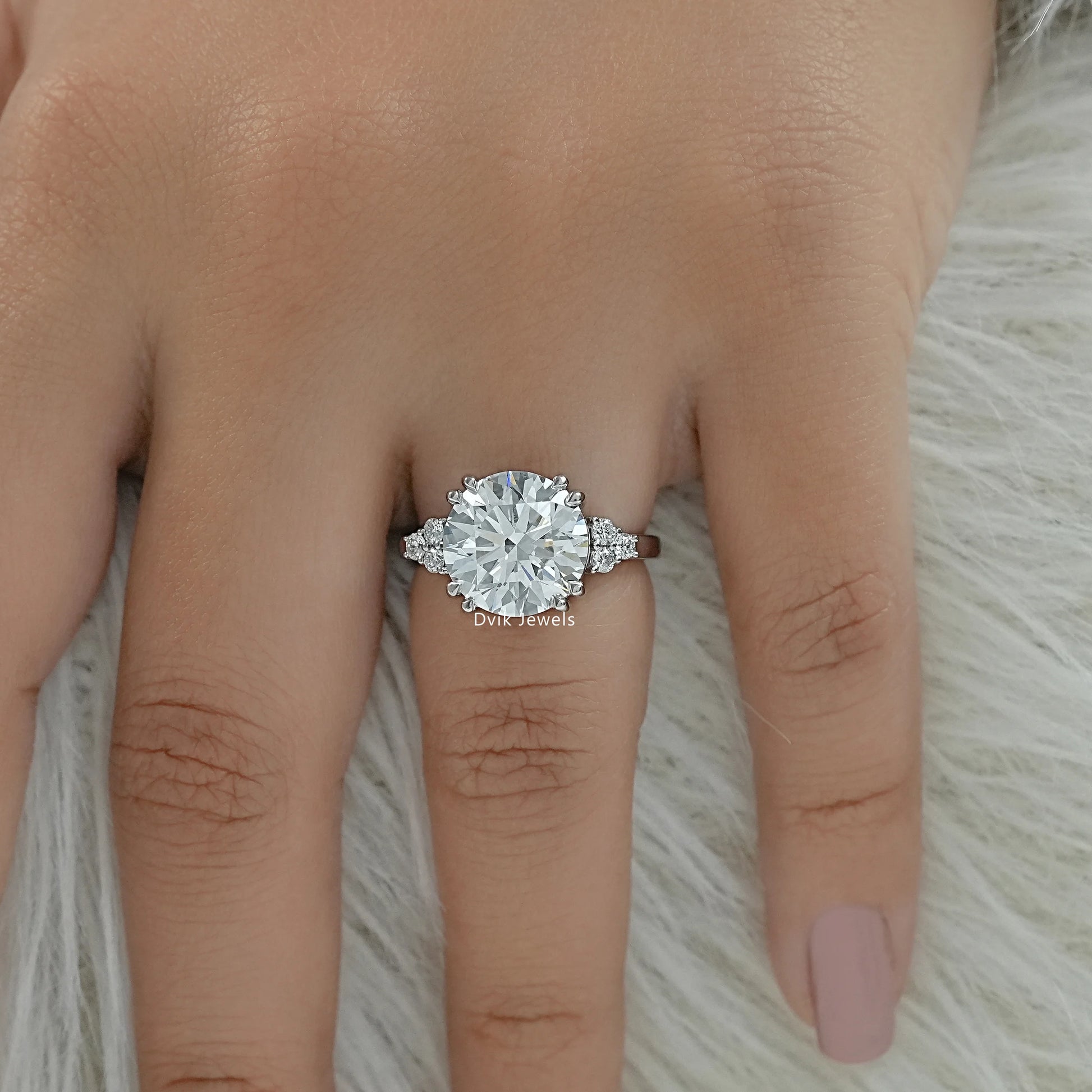 Round cluster engagement ring lab diamond cluster ring on finger top view