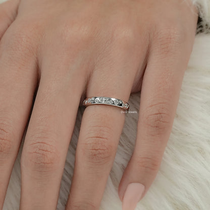 Round Cut Diamond Scattered Bezel Set Wedding Band