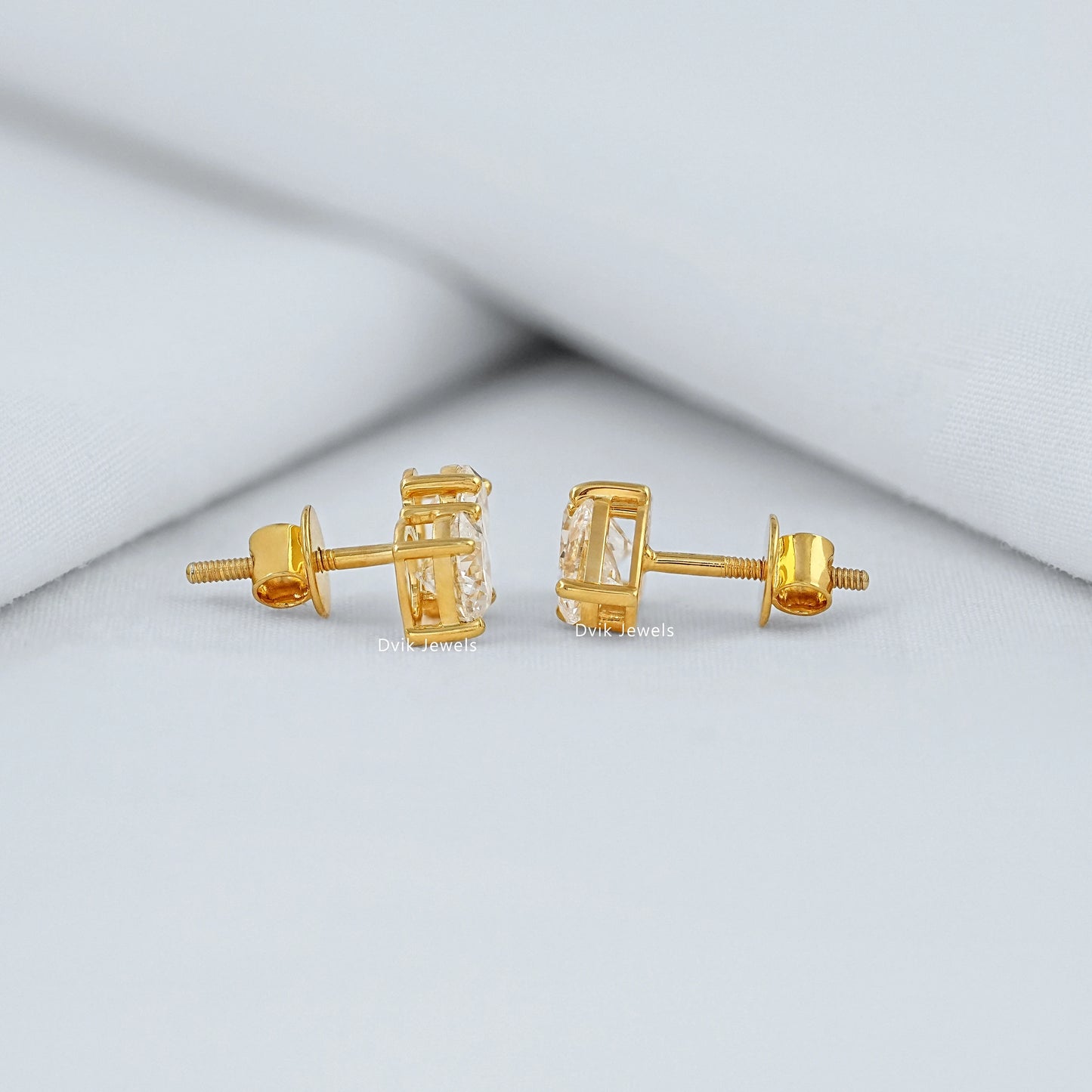 Pear and Round Lab Diamond Toi et Moi Stud Earrings Earrings