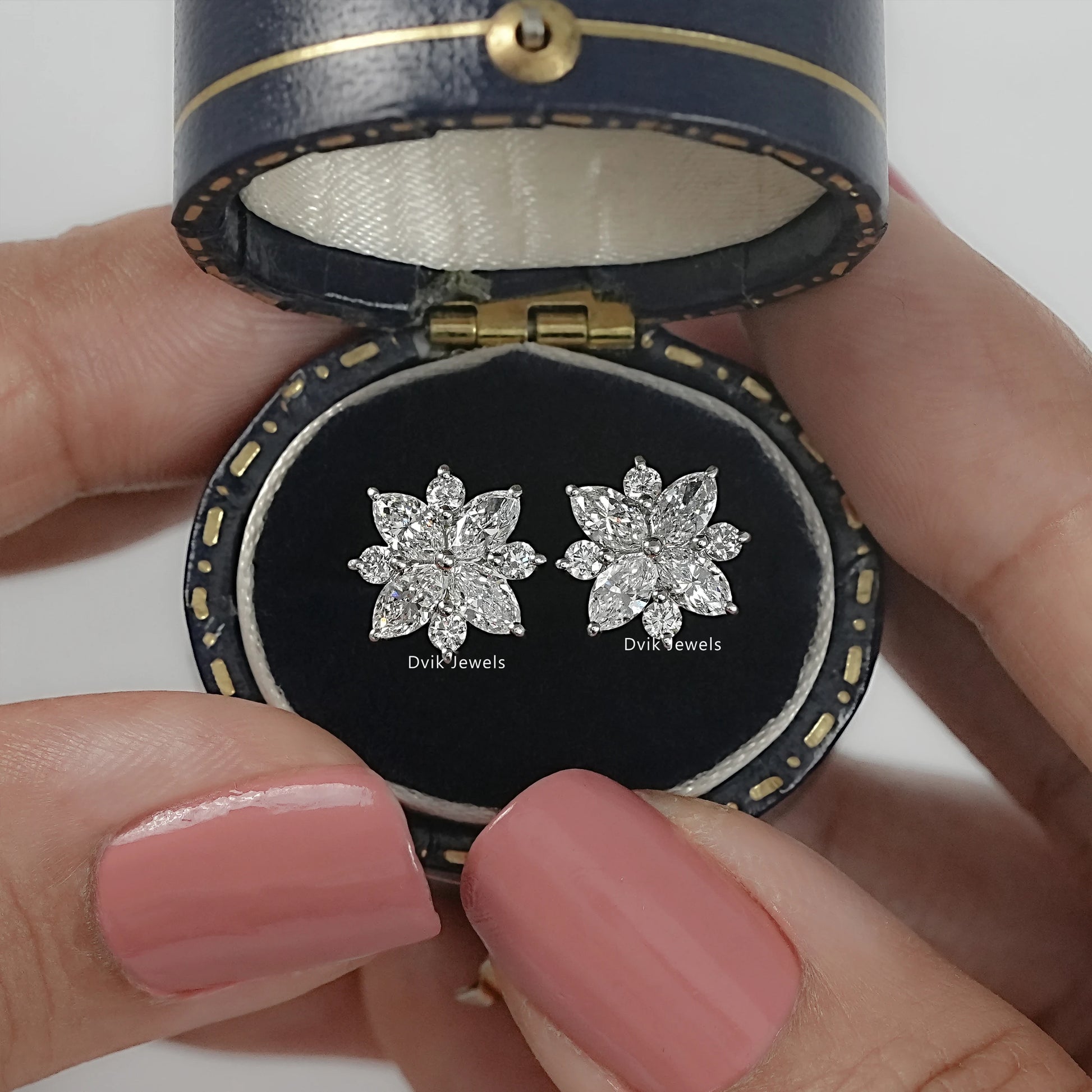 Marquise and round cut diamond flower stud earrings by Dvik Jewels