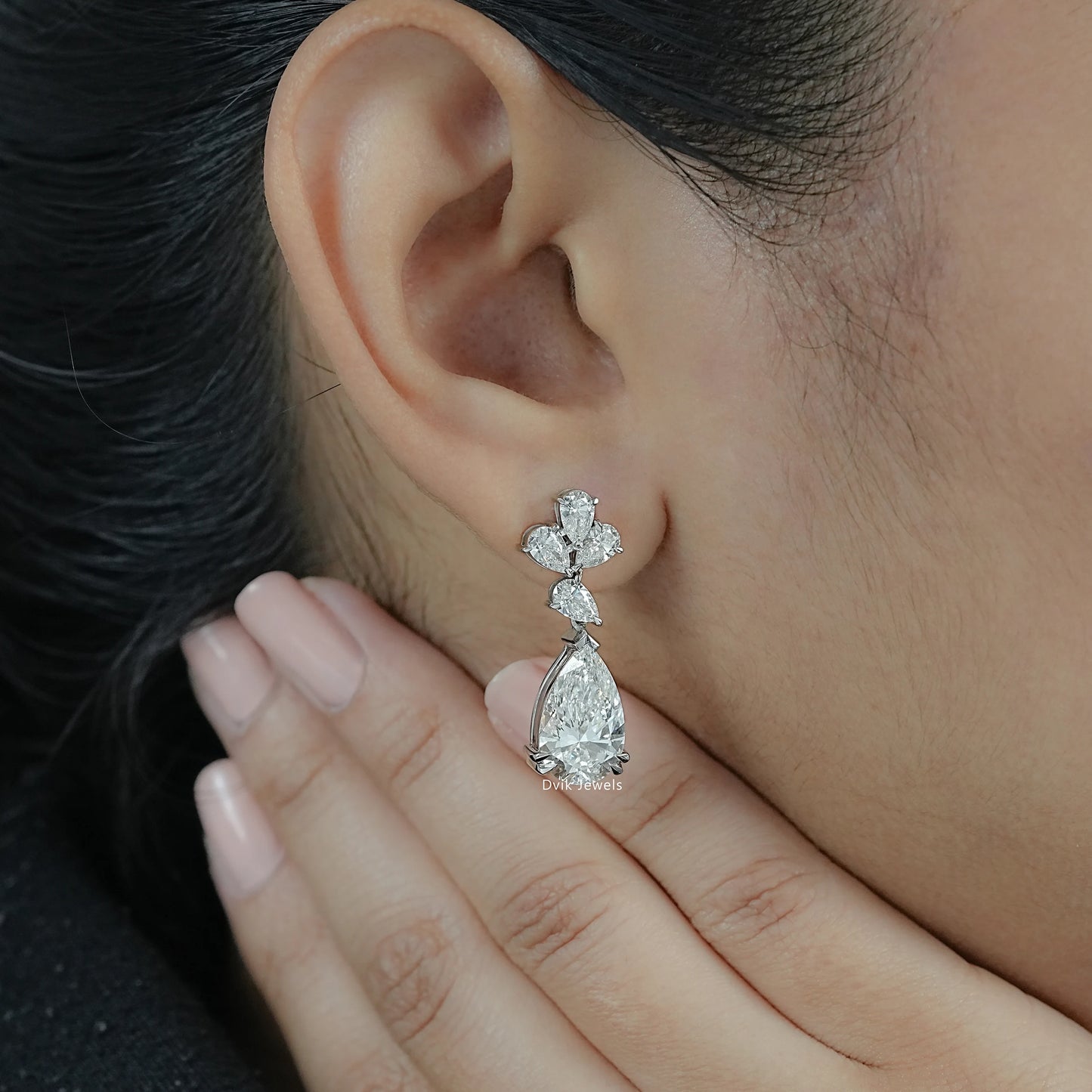 Pear Cut Floral Drop Earrings featuring Lab Made Diamond displayed on ear reflecting luxury sparkle