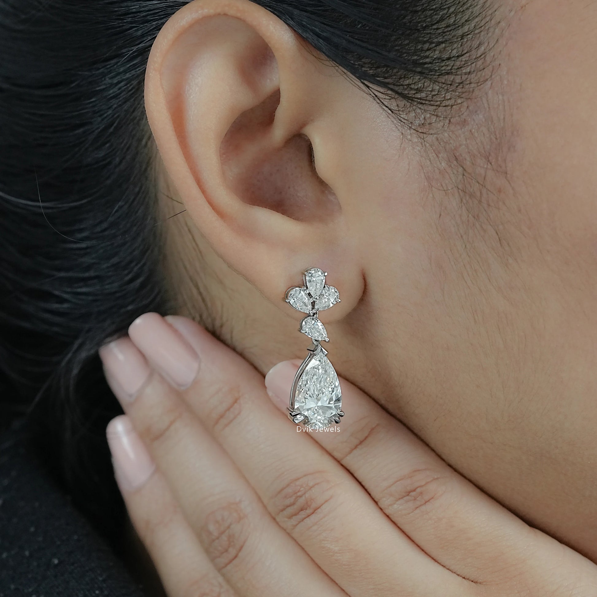Pear Cut Floral Drop Earrings featuring Lab Made Diamond displayed on ear reflecting luxury sparkle