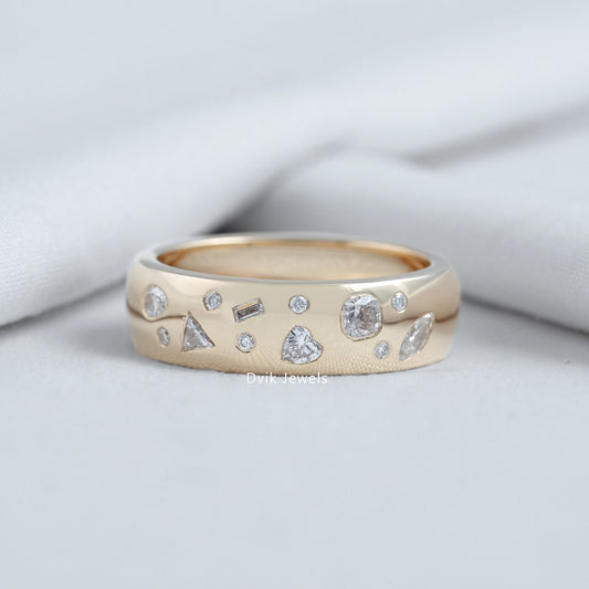 Multi Shape Scatter Band held to show the various lab diamond cuts on gold