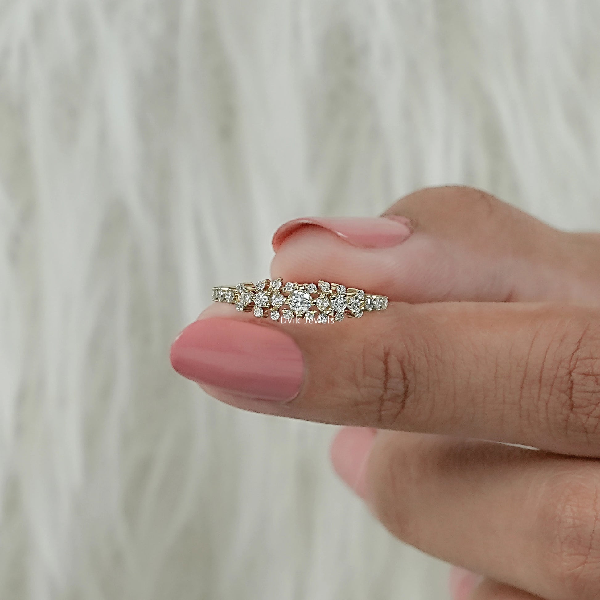 Serenity engagement ring with round brilliant cut diamond​ for front view held by women