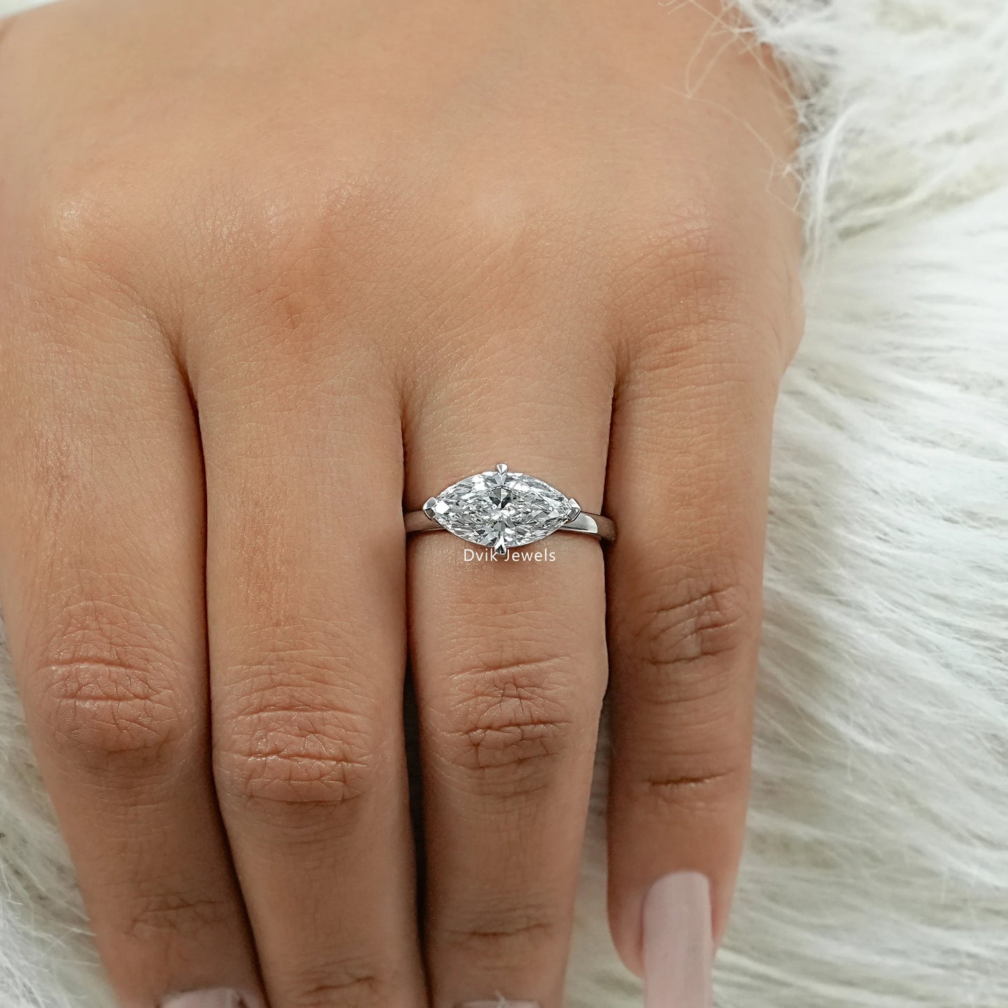 Half Bezel East West Marquise Cut Diamond Ring