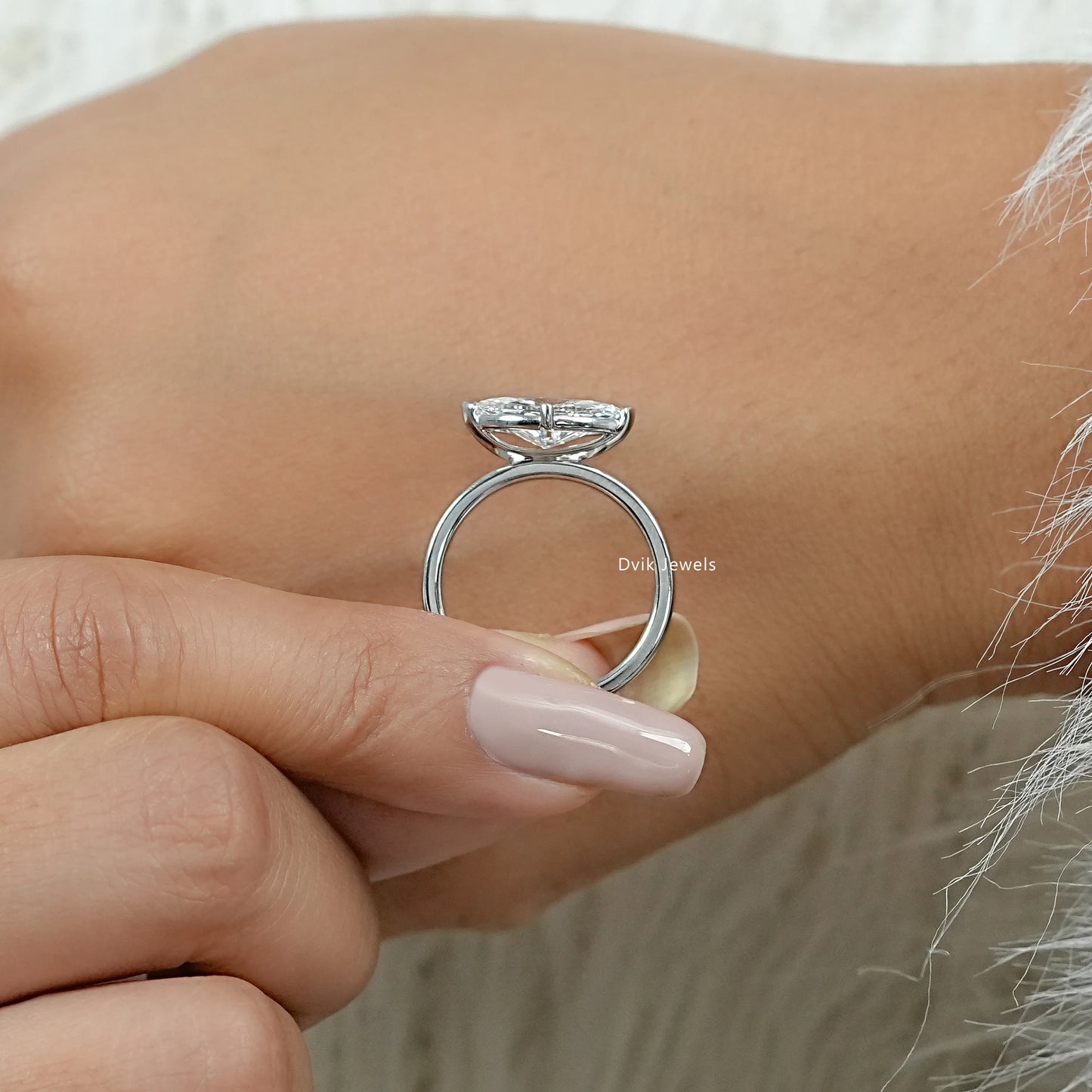 Half Bezel East West Marquise Cut Diamond Ring