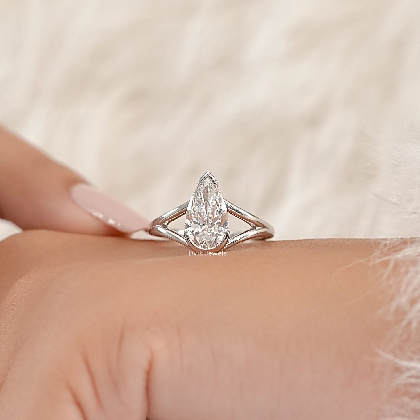 Half Bezel Pear Cut Split Shank Ring