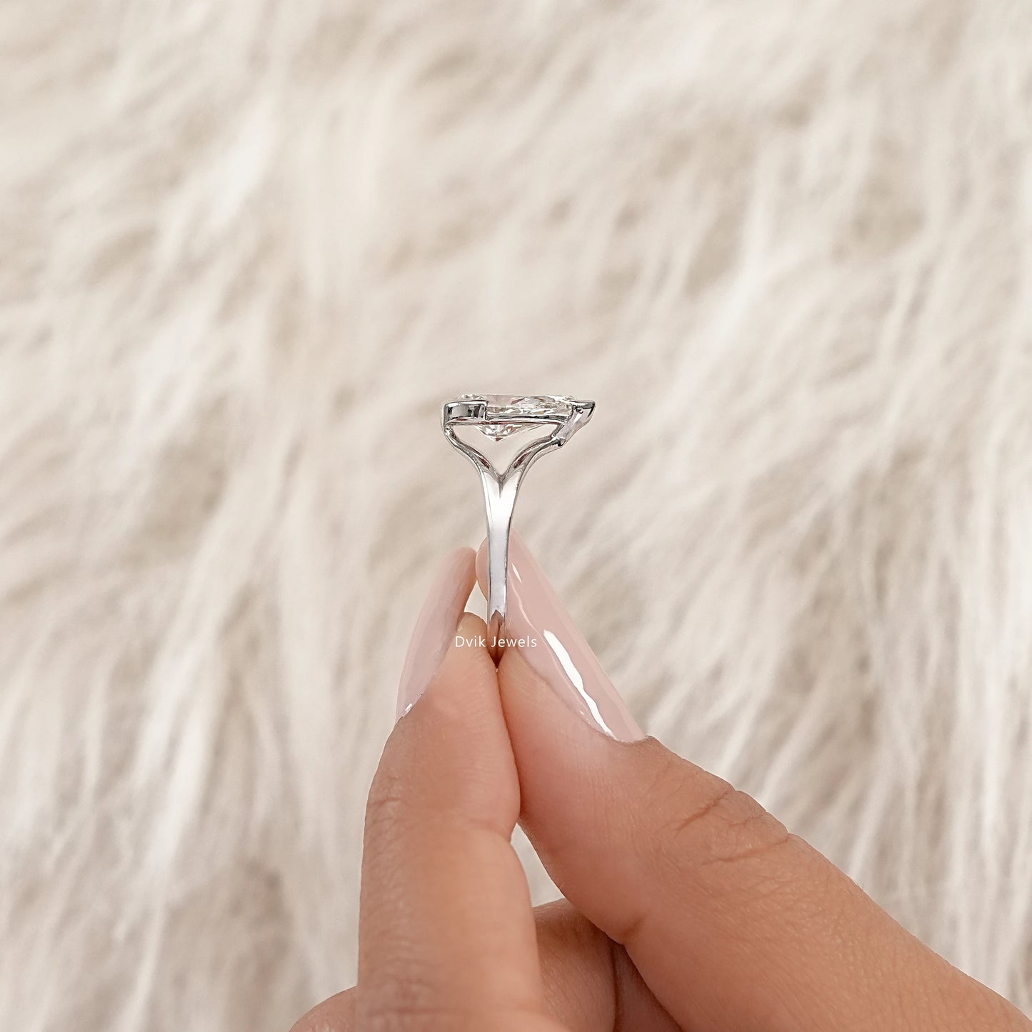 Half Bezel Pear Cut Split Shank Ring