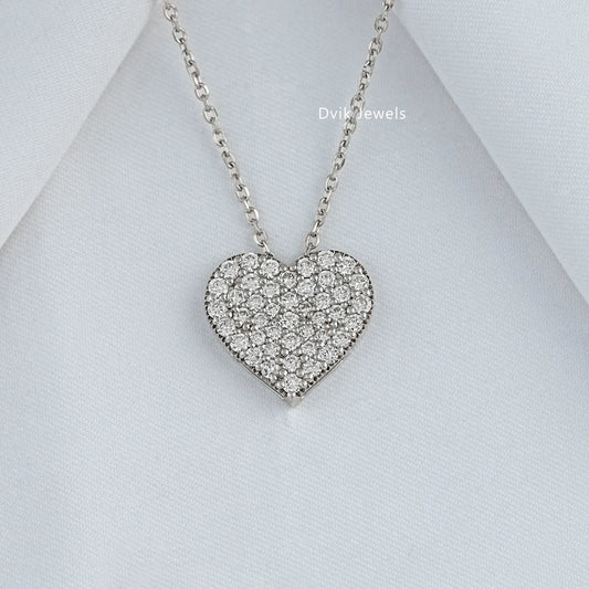 lab grown diamond heart necklace by Dvik Jewels in a green box angle view