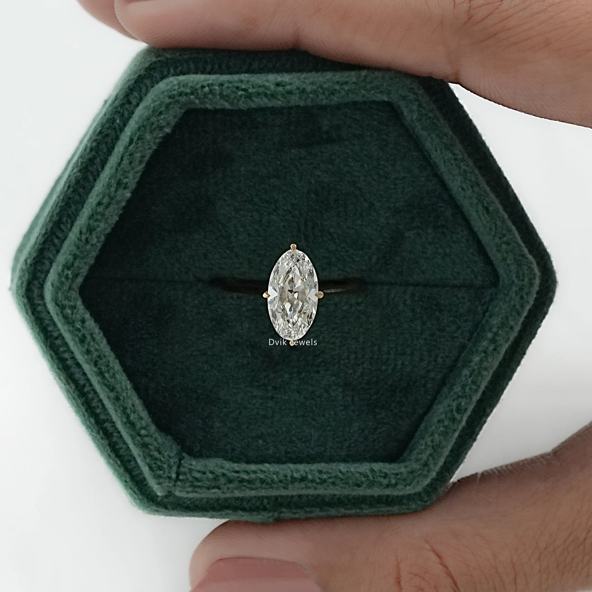 Old mine moval diamond ring for women held on jewelry box