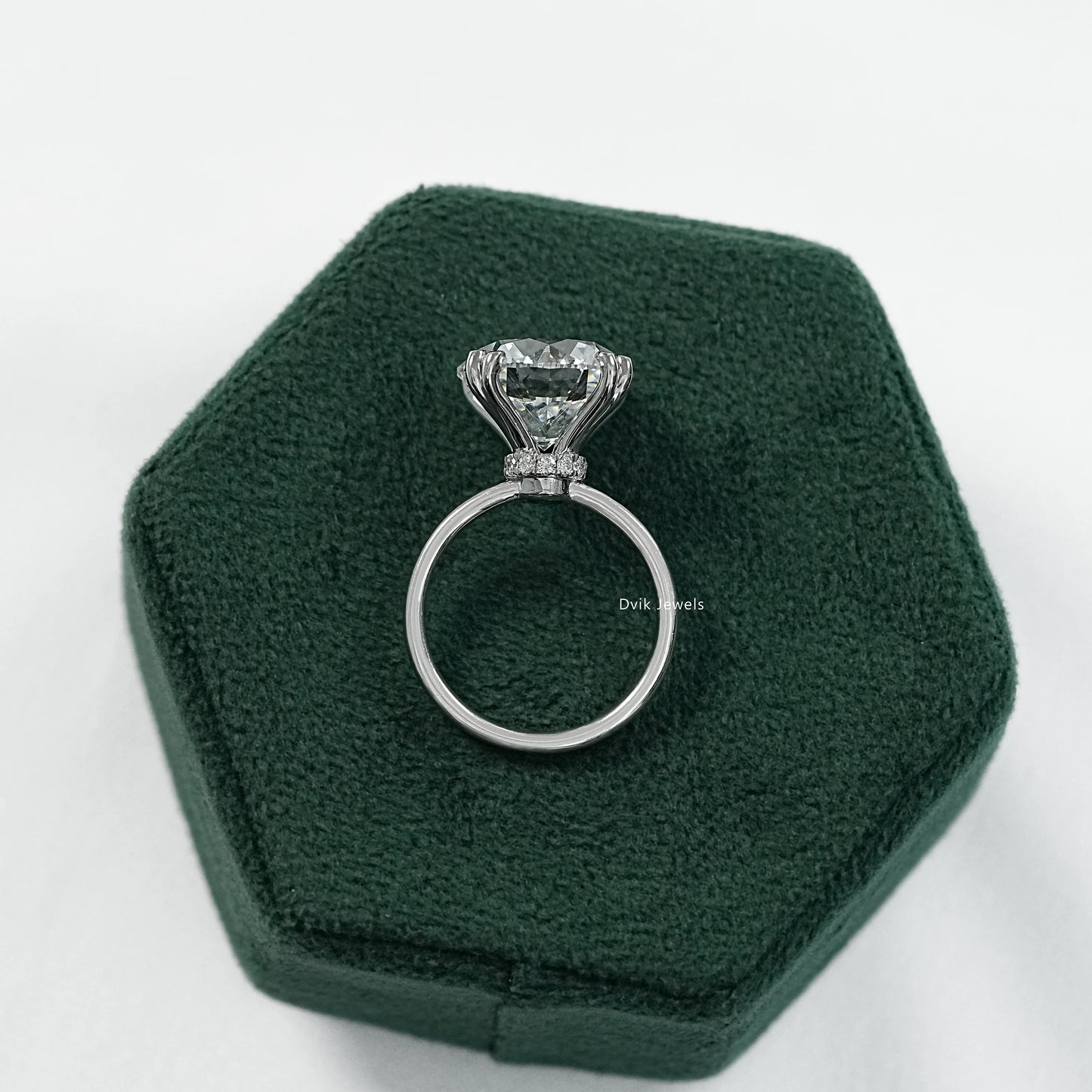 Round engagement ring with hidden halo and 6 prong setting side view