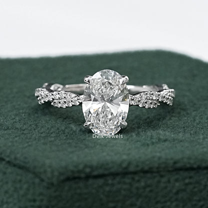 Twist Shank Oval Accent Diamond Ring